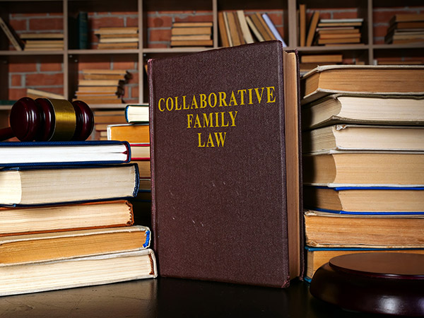 collaborative family law books on a table in a law library