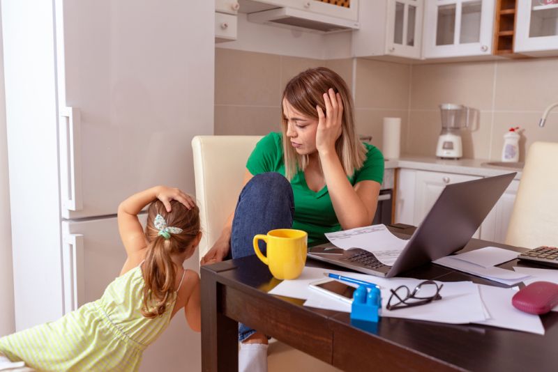 single mother stressed out working